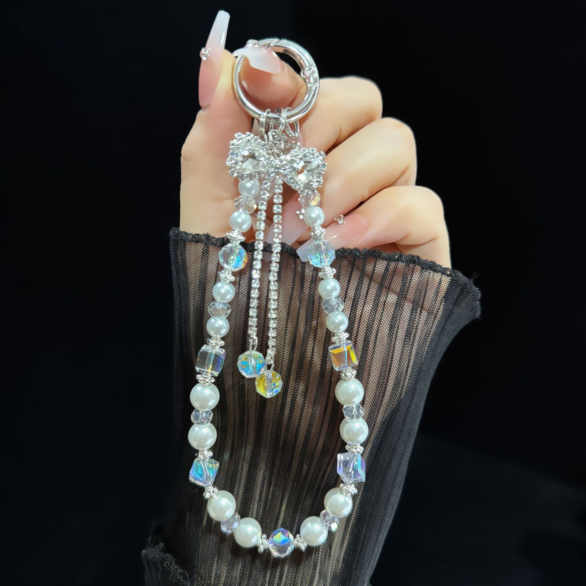 Ligero lujo rhinestone bowknot cadena de teléfono móvil colgante de cristal cadena de muñeca joyería mujer alta sensación cordón de teléfono móvil