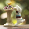 Puppy flower bed bird