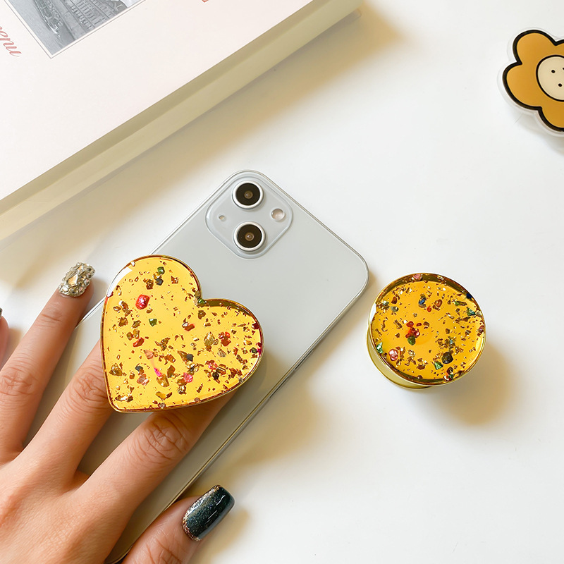 Mobile airbag gold foil cushion with expandable adhesive color electroplating creative phone case bracket niche back_voghion.com