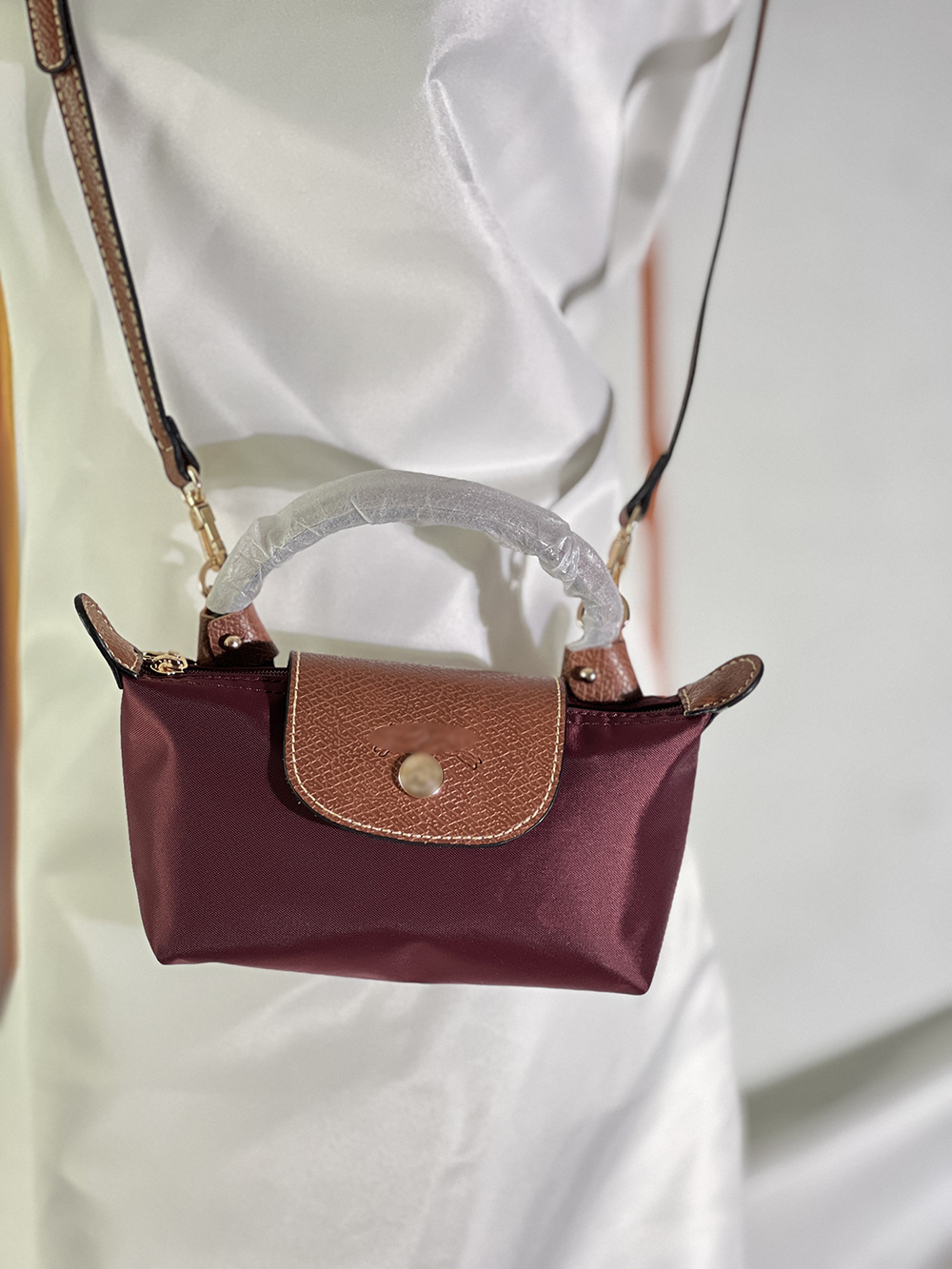 Burgundy red (comes with shoulder strap)