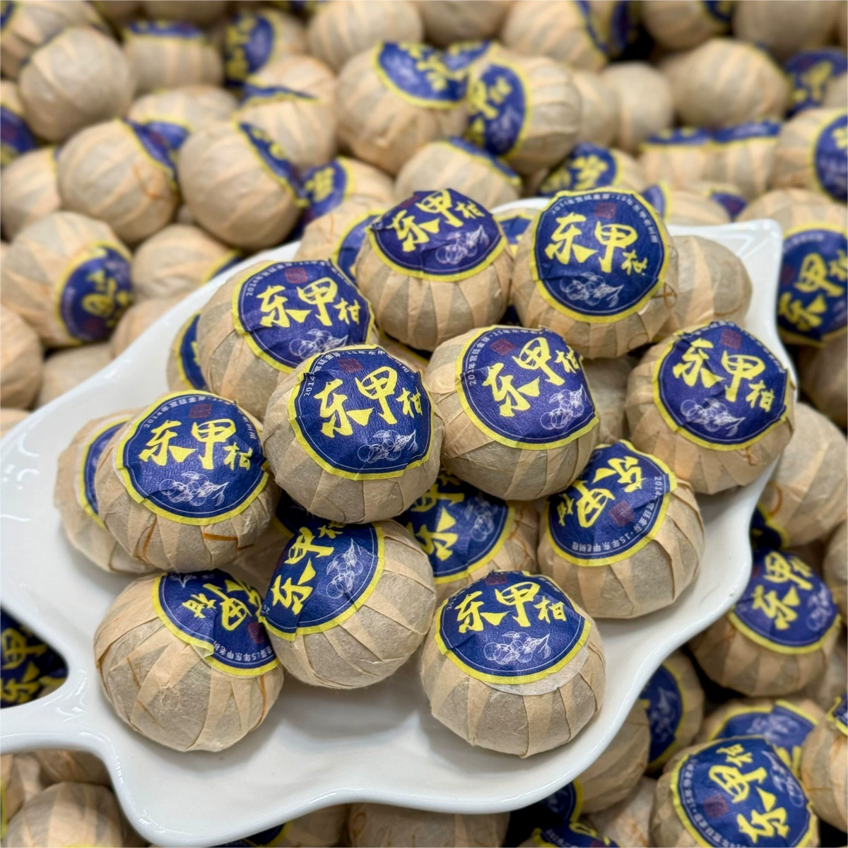 Оптовая продажа Синьхуи Xiaoqing Grugen Shengsheng Pu'er Чай с сыпучим фруктовым ароматом