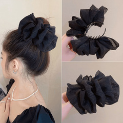 フランス式の黒い蝶結びのヘアピンの女性の気質のレトロで高級感があります。