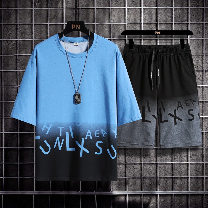 Traje casual de verano para hombres gran tamaño suelto mangas cortas cuello redondo camiseta pareja de dos piezas juego deportivo 7 pantalones cortos