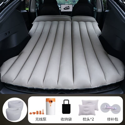 Vehicle-mounted inflatable bed – Modely - gray-tesla-model-y-with-round-white-and-orange-pump-a-pair-of-round-piers