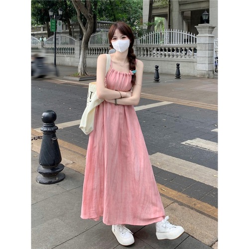 Vacation-style pink spaghetti strap dress for women, 2024 summer, loose and casual, flattering A-line midi dress