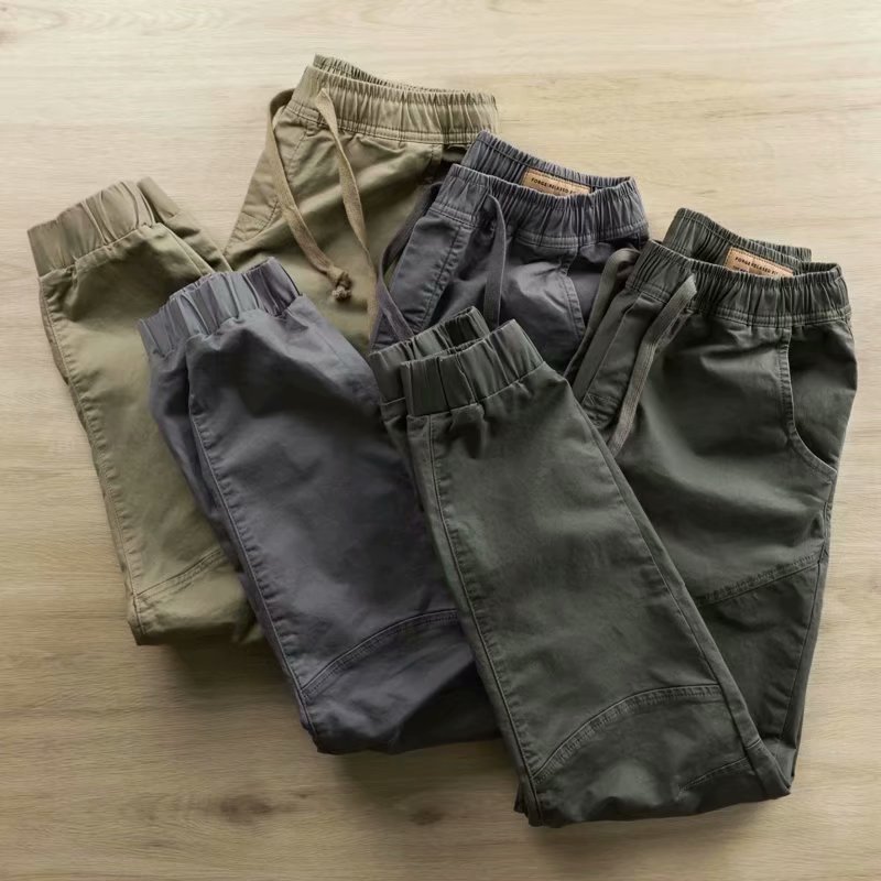 Estilo coreano de color sólido overoles marca de moda para hombres pantalones de protección laboral atados al tobillo primavera y otoño pantalones casuales sueltos para hombres entrega de una pieza