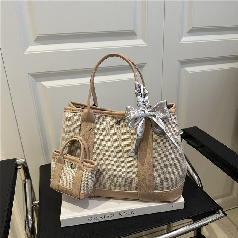 2025 nuevo bolso de lona para mujeres gran capacidad sen-meng simple otoño hombro portátil bolso especial para estudiantes universitarios