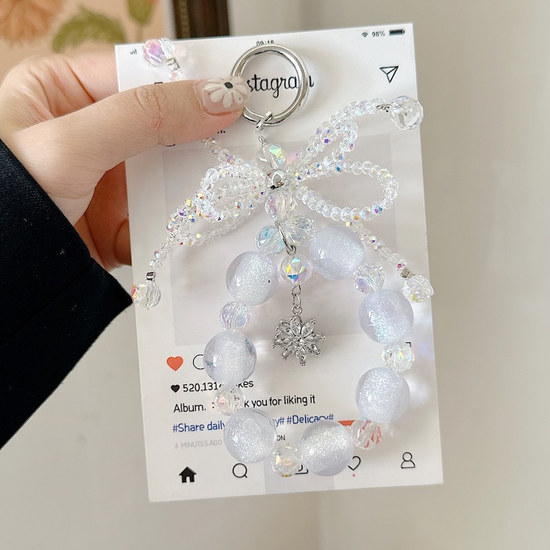 Boutique hecho a mano de alta gama para teléfono móvil cadena femenina ins linda cadena de cuentas de vidrio cordón de teléfono móvil de moda colgante de mensajero largo