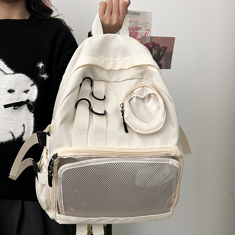Mochila japonesa pequeña y fresca de chicas, moda simple y sólida, mochila de estudiantes de secundaria, nueva mochila de gran capacidad para mujeres.