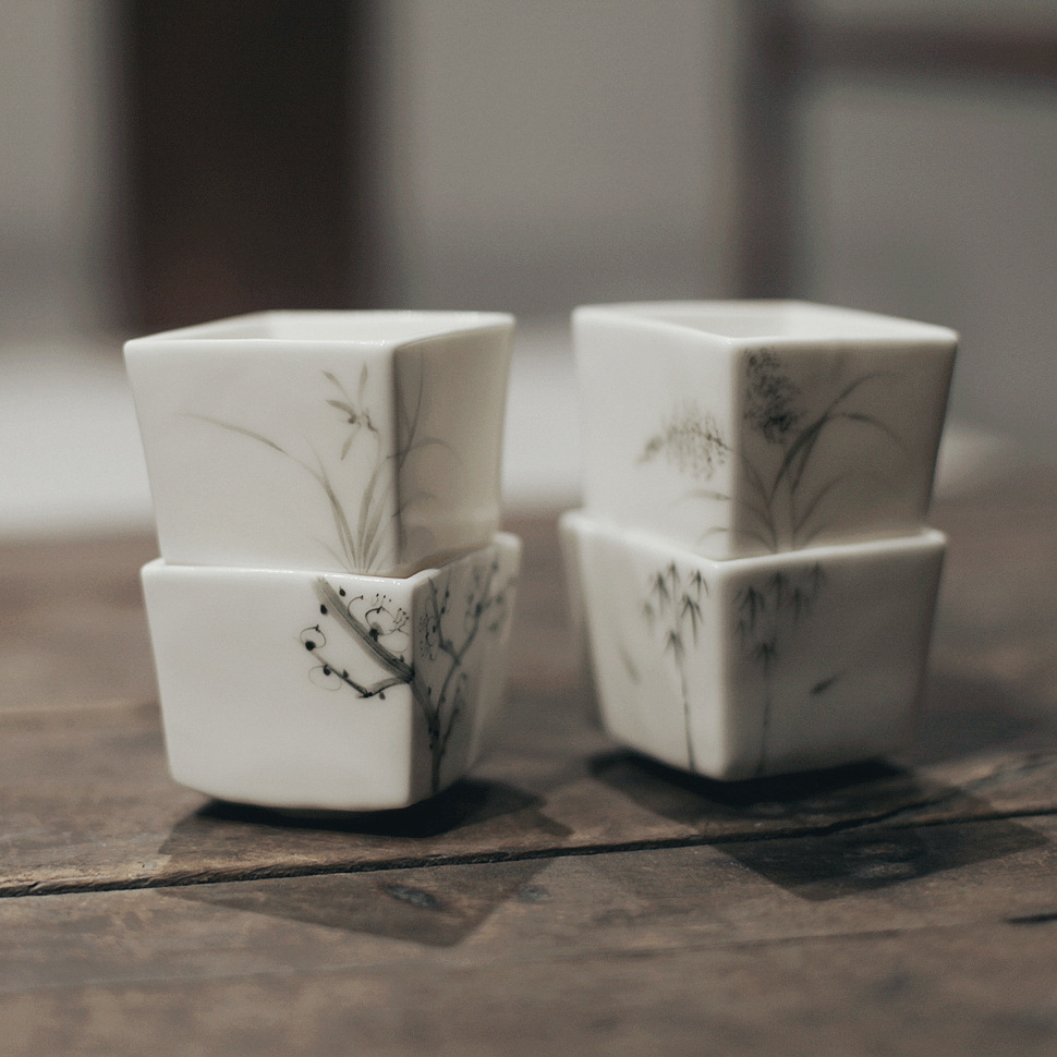 Artesanos de manteca de cerdo blanco taza cuadrada tinta pintada a mano taza de té cuatro caballeros taza de té literatos utensilios de té