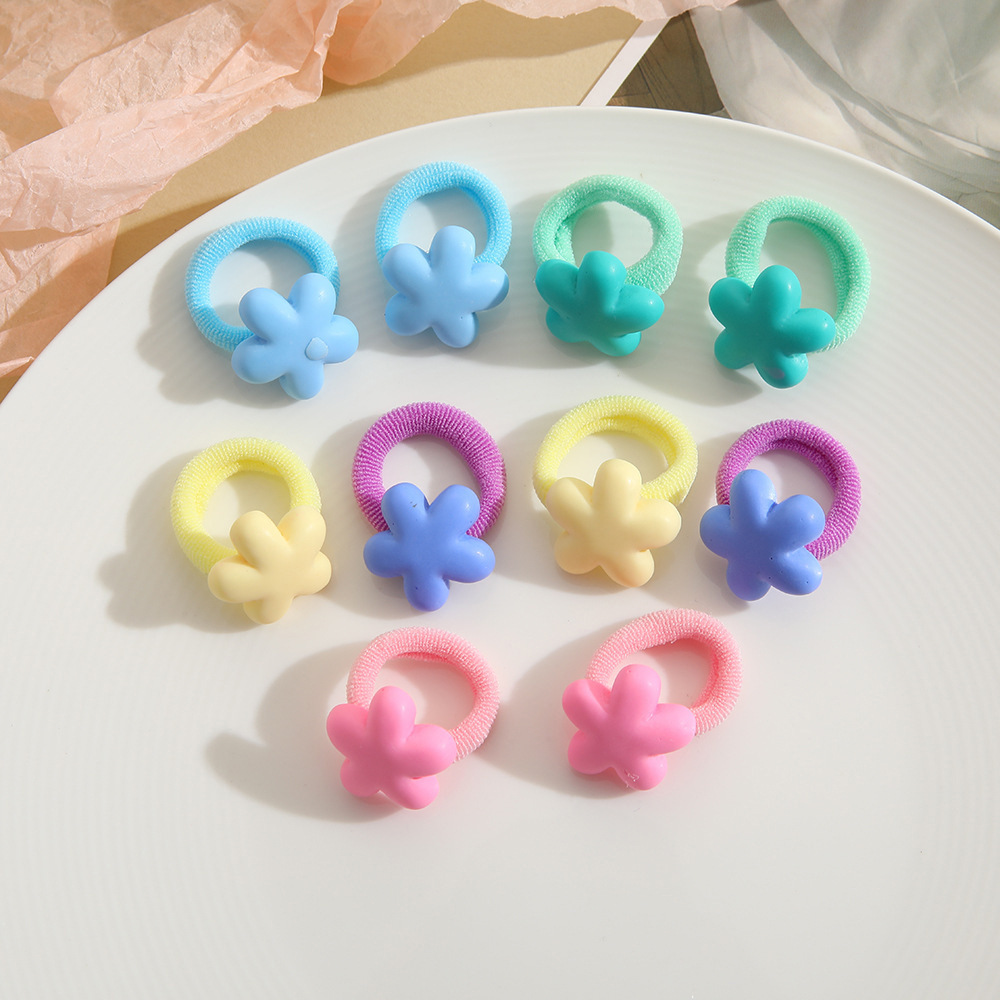 La alta elasticidad de los niños no duele la banda de goma de la cuerda del pelo del bebé de la banda linda del pelo del pulgar de la niña