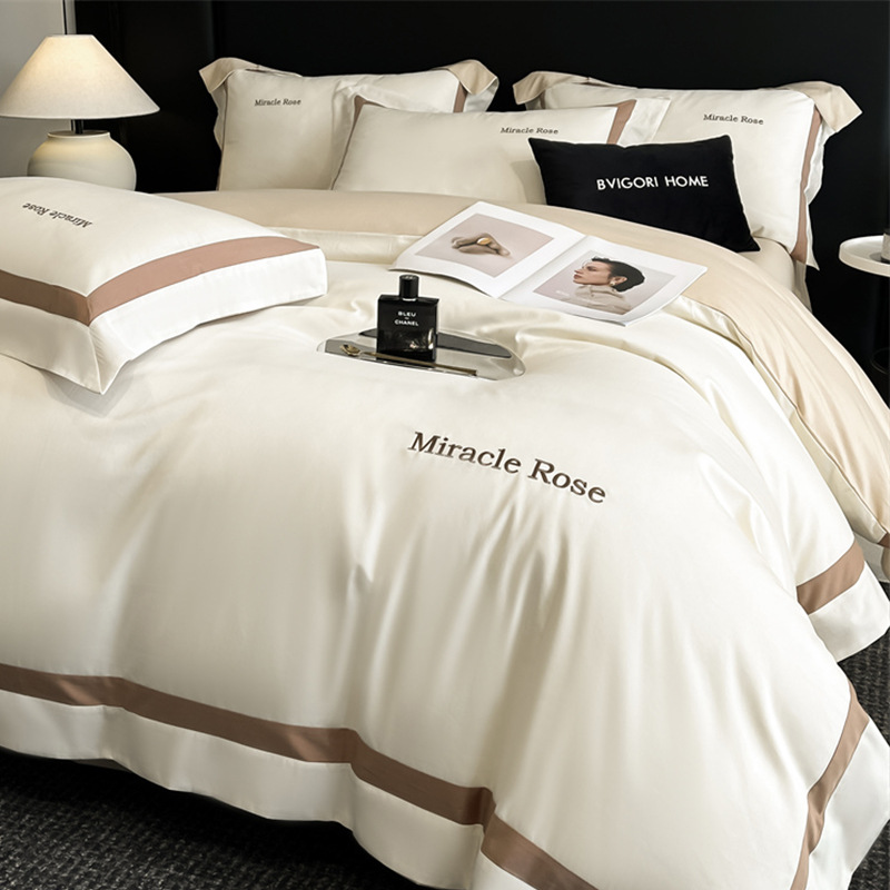 Cama de algodón de lujo ligero de alta gama de cuatro piezas de algodón 2025 nueva ropa de cama de tres piezas con funda de edredón de alta calidad