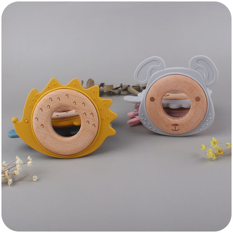 Nuevo bebé suministros de dibujos animados serie Animal anillo de madera mordedor bebé creativo mordedura de goma molar juguete de haya