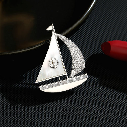 Korean style fashionable autumn and winter clothing accessories mother-of-pearl zircon inlaid high-end brooch Smooth sailing creative design sailing brooch