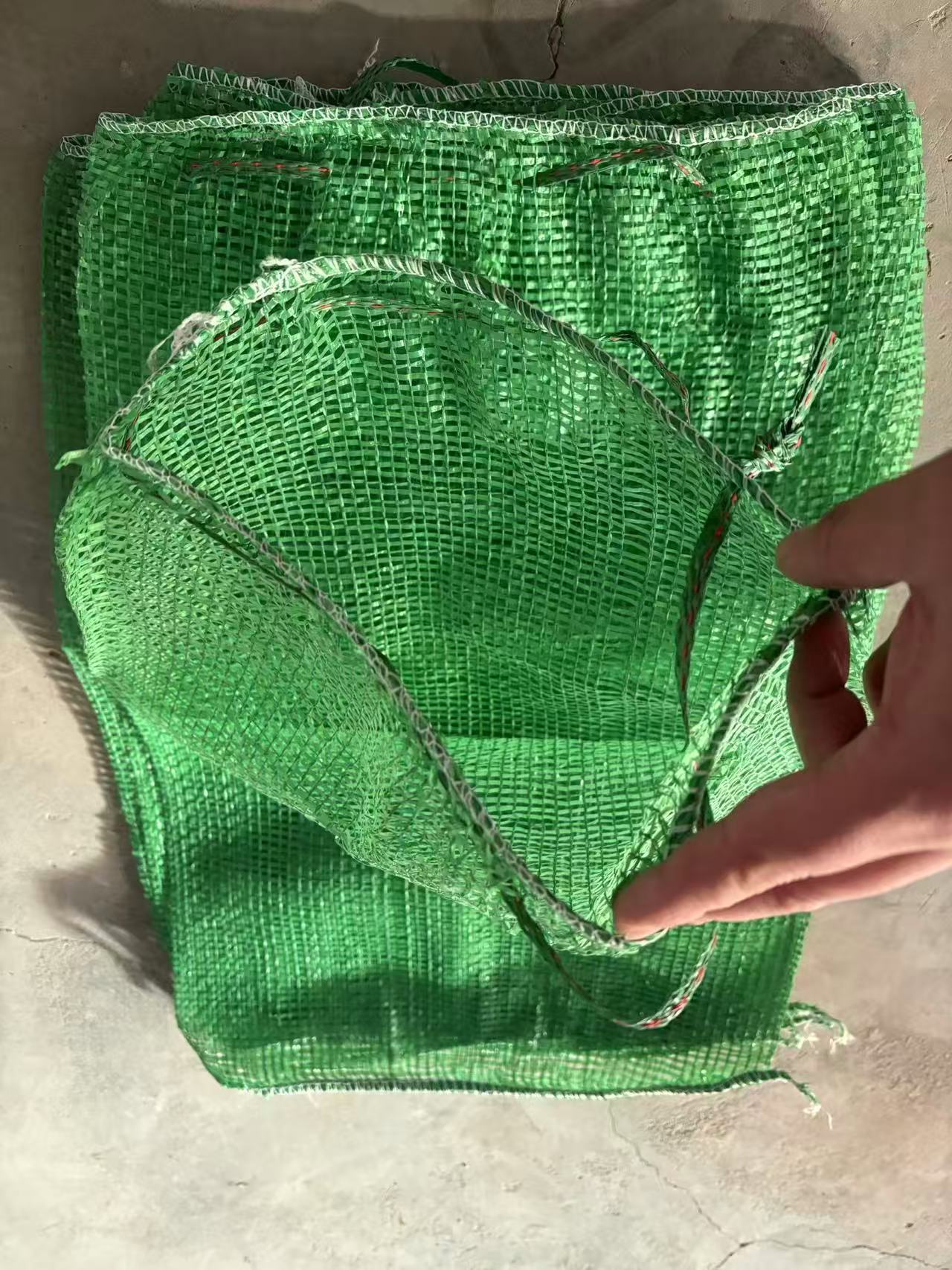 Bolsa ecológica de filamento corto de semilla de hierba verde, bolsa de vegetación para protección de pendientes resistentes al envejecimiento y protección ambiental de diques de río
