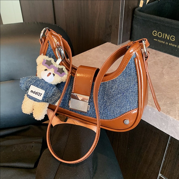 Cross-border 2025 otoño y invierno nueva moda denim bolsos debajo de la braza de la mujer texturas coreanas bolsos de hombro de viaje mochila