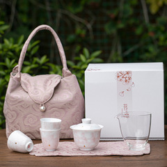 花の咲くお茶のないグラデーションの蓋の陶磁器の旅行の茶器の携帯は布の包みの小さいセットのピンクの女性の品茗杯を収納します。
