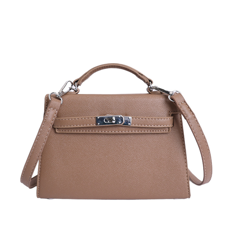 Botón de plata estampado de palma portátil Kelly bolso pequeño para mujeres 2026 ventas transfronterizas calientes nuevo lujo ligero de alta sensación mochila