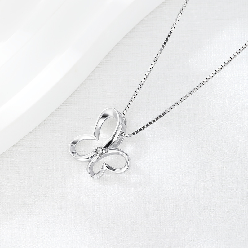 Nuevos accesorios transfronterizos S925 plata esterlina con diamantes collar de mariposa hueco moda femenina simple insecto animal colgante