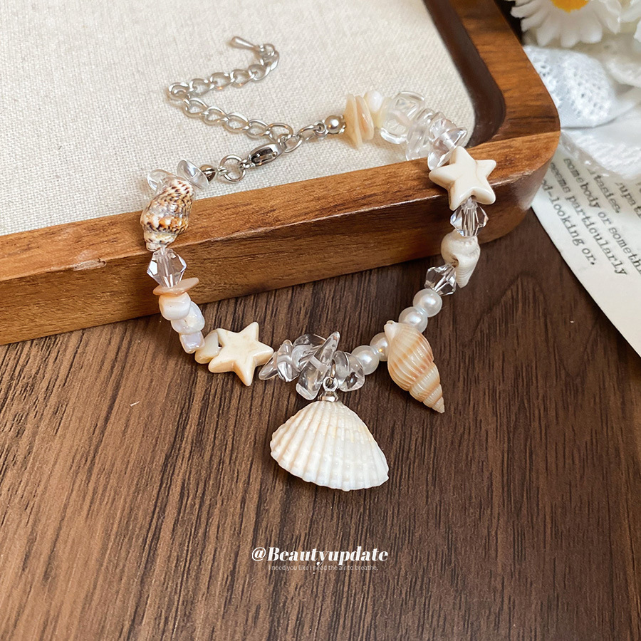 Collar colgante de concha de perlas de cristal de perlas de arroz con incrustaciones de diamantes, cadena de clavícula de viento de vacaciones junto al mar, collar fresco y dulce al por mayor