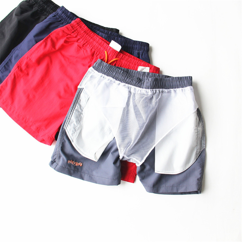 Summer European and American single men's loose casual mesh lining shorts fashion quick-drying cool breathable waterproof beach pants