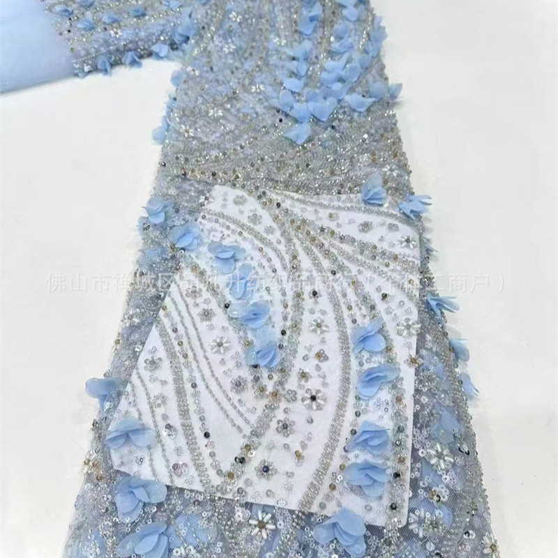 Tejido de bordado de tubo de perlas decalcado a mano diseño ligero lujoso de moda espectáculo de escenario vestido de tela de encaje