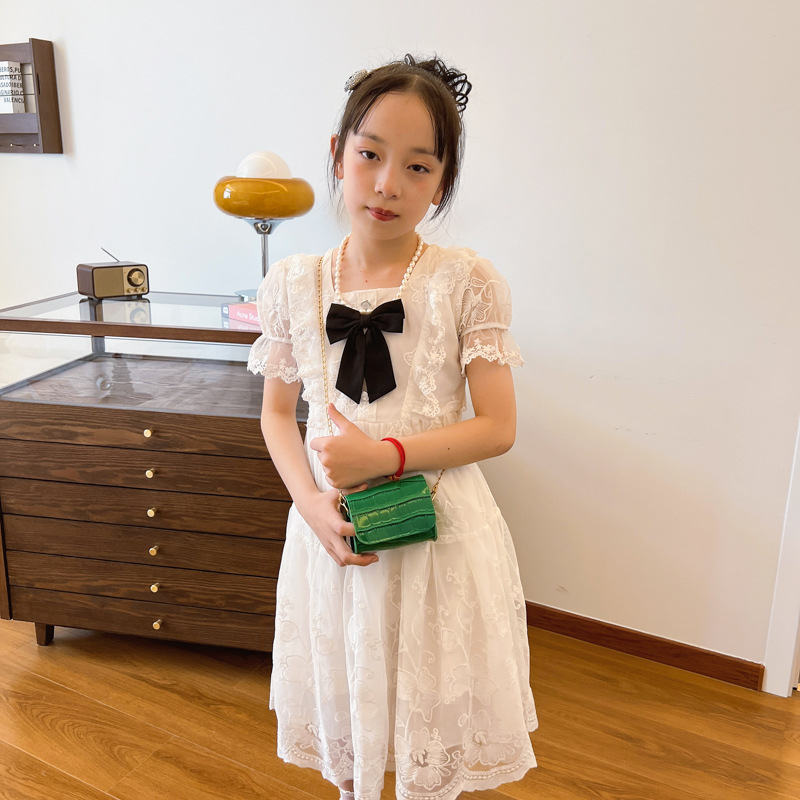 2025 nueva cadena bolsos de moda para niños bolsos de hombro de color sólido para hombres y mujeres bolsos de piedra de estilo extranjero bolsos de mochila para niños