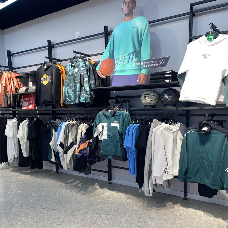 Mujeres y mujeres transfronterizas marca deportiva de ropa de exhibición estante de exhibición multicapa tienda de colgar percha de ropa estante de exhibición de ropa