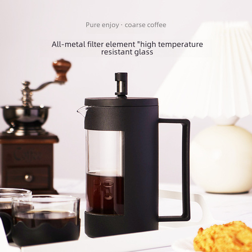 A French-style coffee pot and tea brewer made of stainless steel, featuring a semi-enclosed geometric design