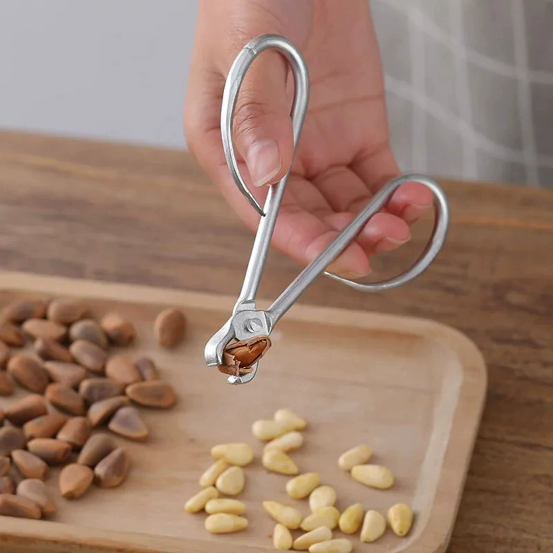 Classic pine nut clip practical use of pine nut pliers Nut clamps saving durable pine nut artifact opening