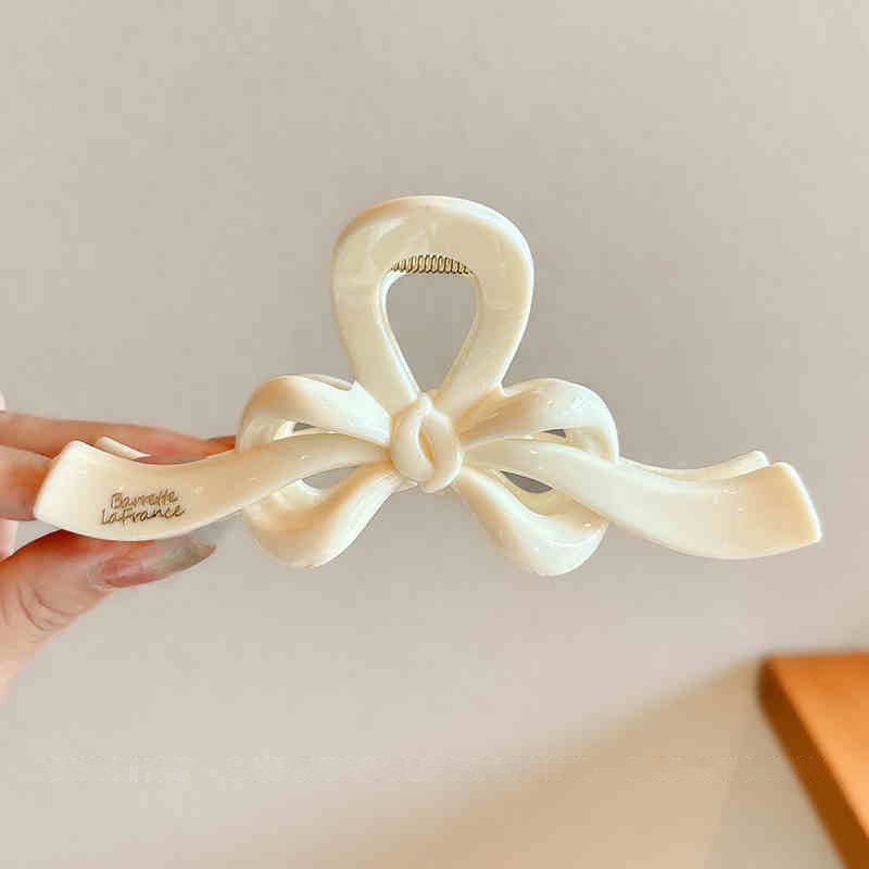 Temperamento arco flotante clip para el cabello de mujer cantidad de diseño de clip de tiburón tarjeta de cabello detrás de la cabeza agarrar clip para el cabello