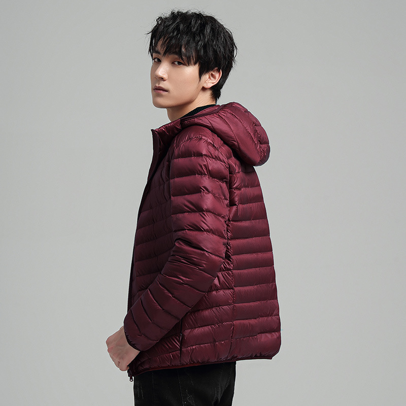 2024 nuevo otoño y invierno ligero plumas de algodón corto encapuchado deportivo casual ligero abrigo cálido de moda masculino impresión GO