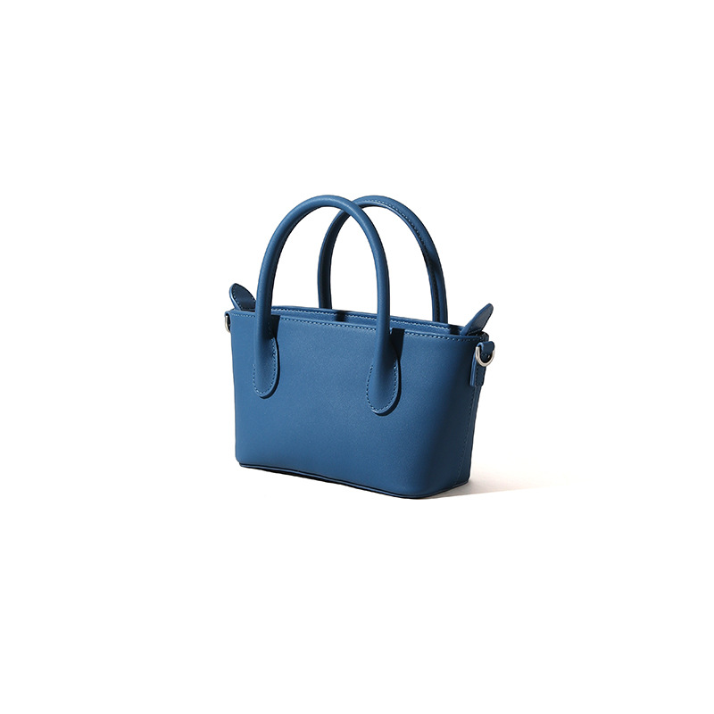 Bolso retro de gran capacidad para mujeres 2025 primavera nueva moda textura bolso de mano bolso de hombro de viaje universal