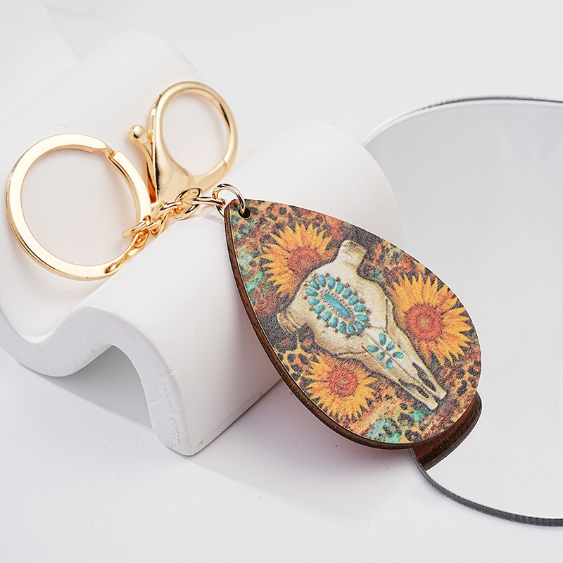 Cross-border Europe and the United States Western Exaggerated Cattle Skull Keychain Personalized Fashion Color Printing Sunflower Metal Key Ring Pendant