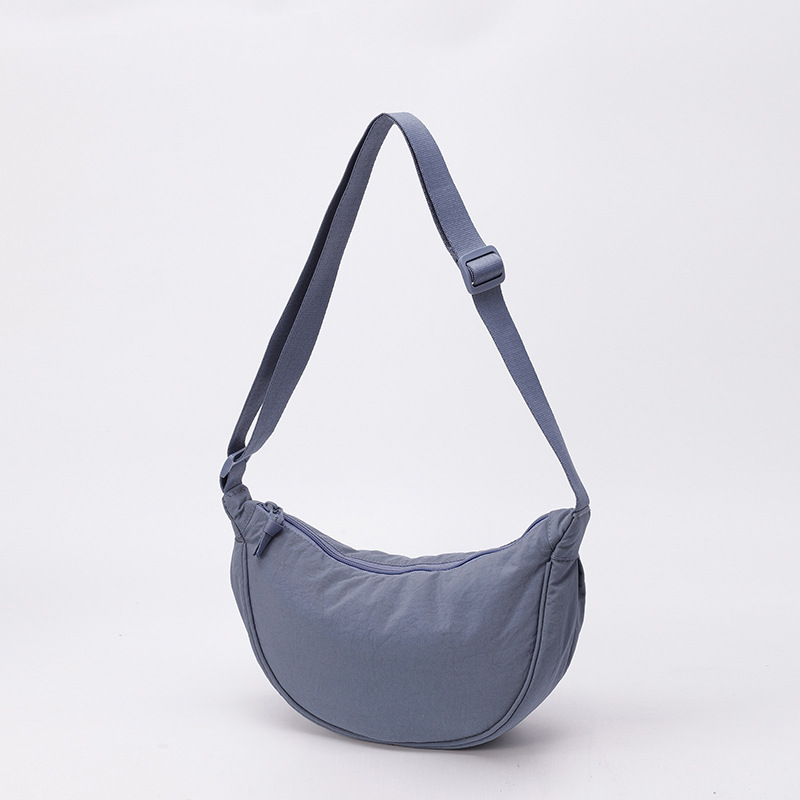 Bolso de tela pequeño bolso de moda ligero bolso de mochila de nylon transfronterizo mujer bolso de hombro casual versátil bolso de bolsas de bolsas de bollo de gran capacidad