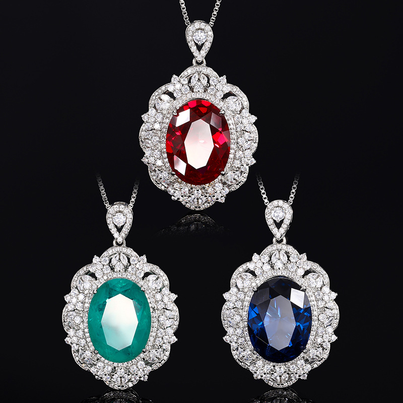 2024 nueva joyería Zhuang Shengsheng fondo de cobre chapado en oro simulación corindón rojo cristal puntiagudo azul colgante de lujo ligero mujer 15*20