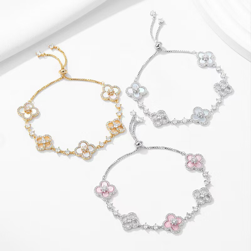 New Bracelet with Shiny Natural Mother-Of-Pearl Hollow Lucky Four-Leaf Clover Pull-Out Jewelry for Women, Niche Light Luxury Jewelry
