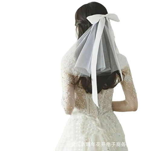 Double-layer white short travel-style veil with butterfly design for wedding photoshoots—perfect bridal accessory for trendy online photo sessions and celebrations.