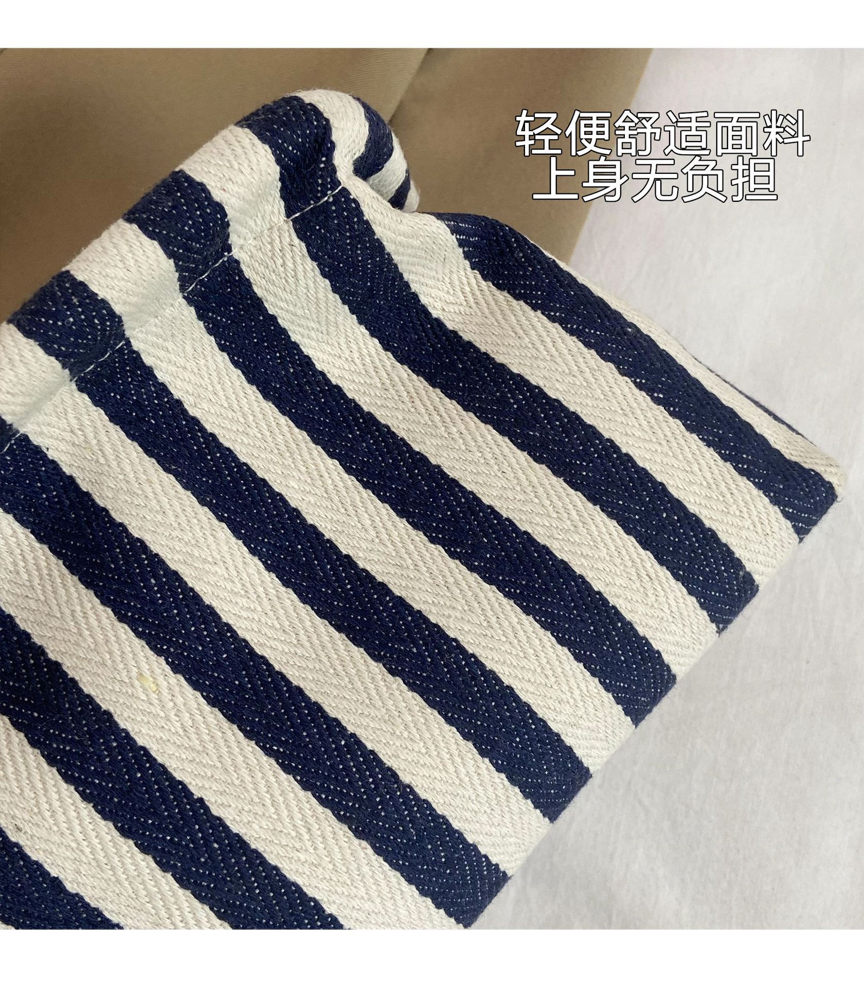 New cross-border fashion color-blocking striped cosmetic bag, women's loose change mobile phone storage bag, trendy and niche cloud clutch undefined
