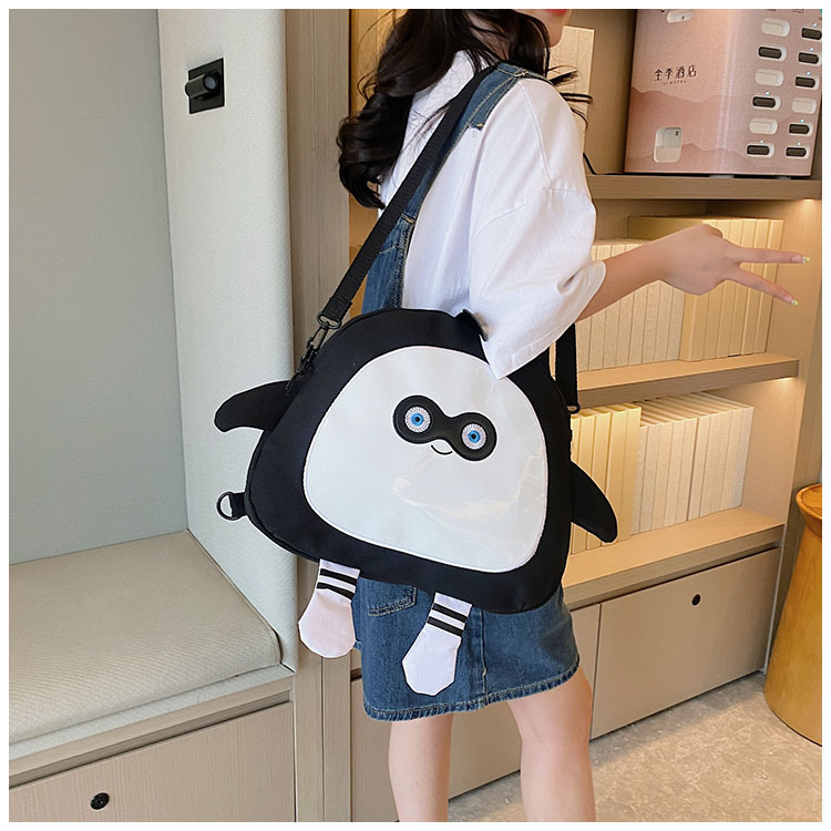 The new 2024 children's egg-shaped party backpack is a cute cartoon canvas single-shoulder bag and a fashionable and stylish small backpack undefined