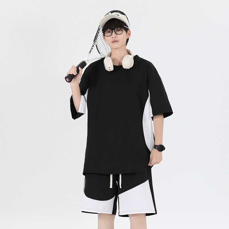 Tren de moda de verano Traje de ocio deportivo juvenil para hombres Pantalones cortos sueltos de manga corta de gran tamaño Hermoso traje de dos piezas para hombres