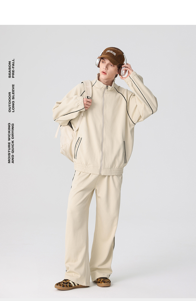 Completo casual da uomo alla moda con colletto alto, giacca, pantaloni a gamba larga, modello cardigan dal design ampio abbinato a pantaloni sportivi_voghion.com