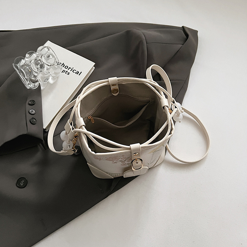 Nationalt nichedesign super populær vestlig bucket-taske, ny kinesisk stil 2024 enkelt skulder crossbody-taske_voghion.com