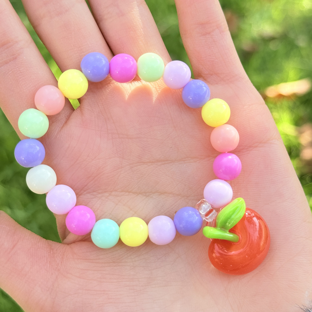 Pulseras infantiles coloridas con cuentas y varios colgantes de dibujos animados, accesorios de alta calidad y exquisitos para niñas, regalos de cumpleaños, productos al por mayor.