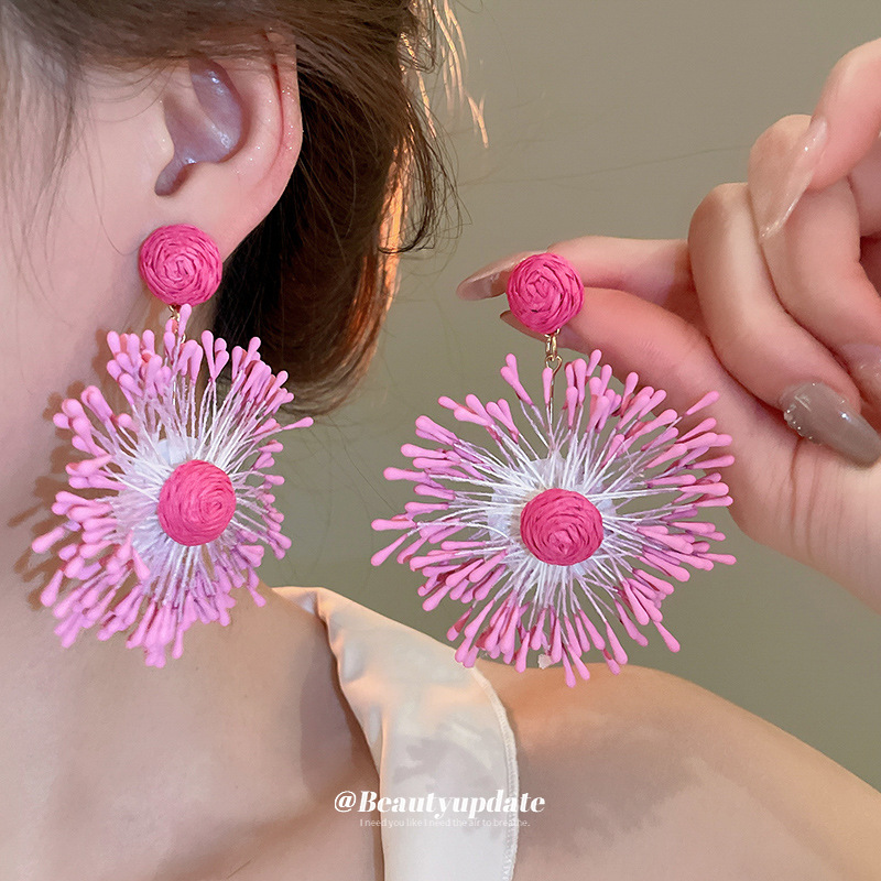 Pendientes de flores tejidos a mano Pendientes de estilo de vacaciones de playa personalizados Pendientes de moda de todo fósforo Sensación de clase alta de nicho