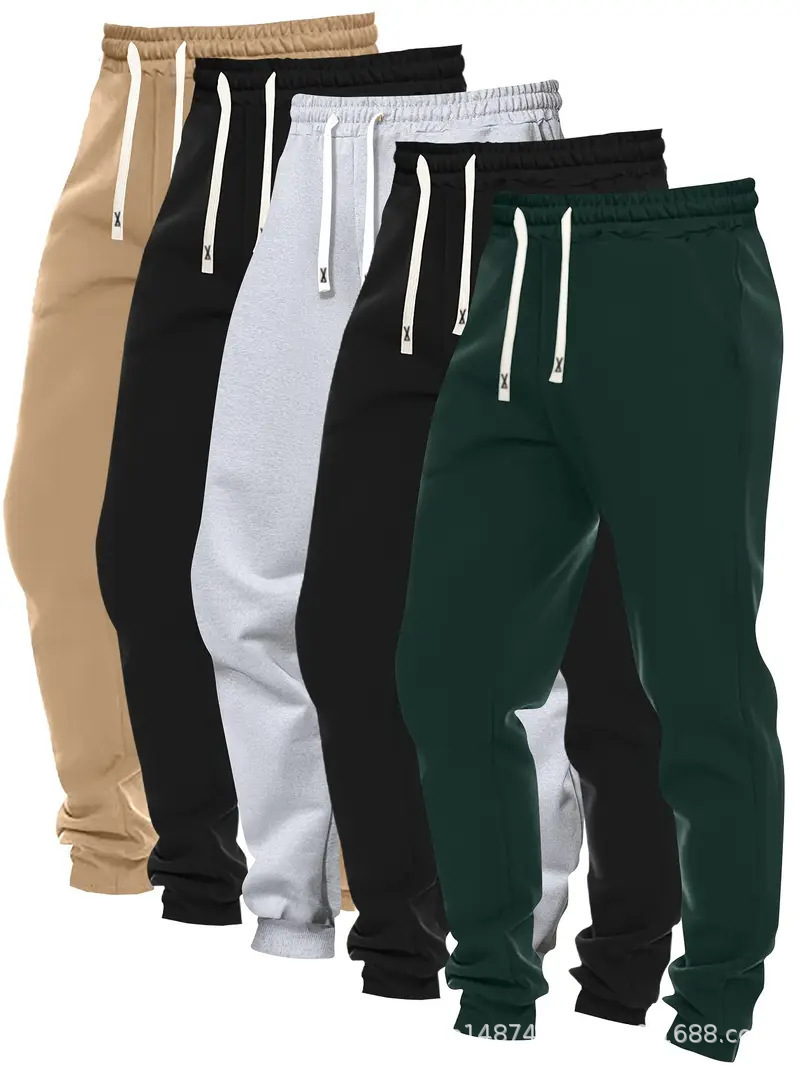2026 explosión transfronteriza pantalones deportivos de moda masculinos de cinco piezas de color sólido cómodos ociosos pantalones de alimentación directa plataforma