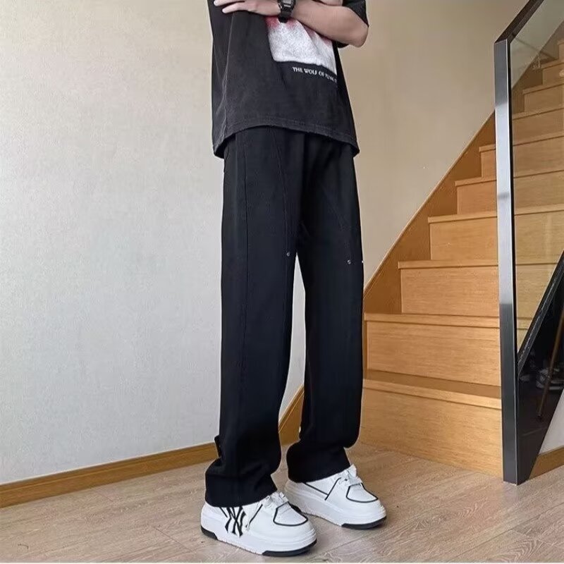 Pantalones vaqueros con botones viejos lavados de la calle americana Pantalones largos de estilo vibe rectos sueltos de primavera y otoño para hombres