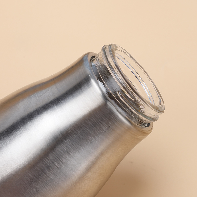 Botella de condimento de acero inoxidable al por mayor Botella de pimienta de sal Botella de pimienta giratoria Botella de condimento de vidrio de cocina multifuncional