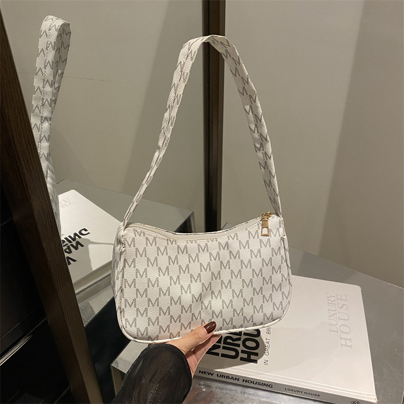 Bolsa de media luna impresa retro bolso de otoño nicho de diseño de estilo occidental 2024 nuevo bolso de hombro bolso de mano hermoso