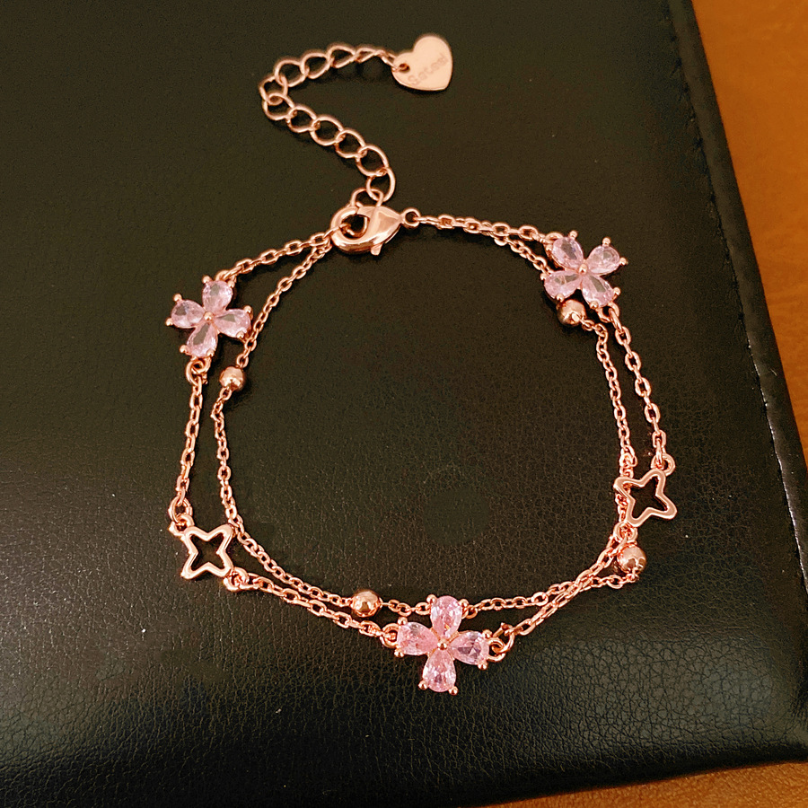 Flores de hierba afortunadas pulsera de doble capa ligera de lujo nicho pulsera de alta sensación temperamento diario joyas de moda al por mayor image 9